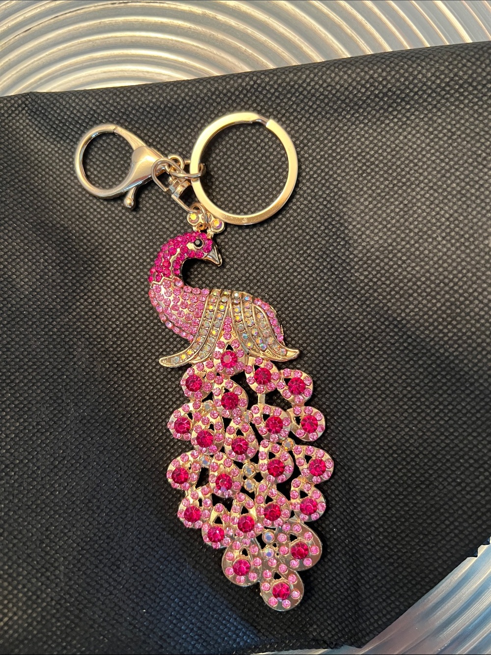 PEACOCK KEYCHAIN- Pink, Red and Iridescent stones set in Gold tone.
